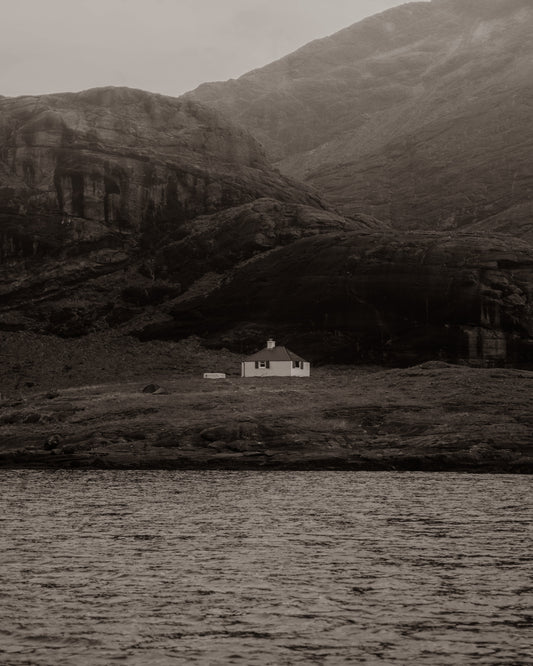 Lone house next to water